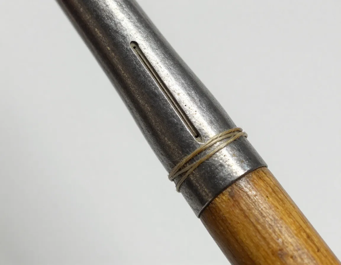 Hand rolled hosel with visible seam on antique club