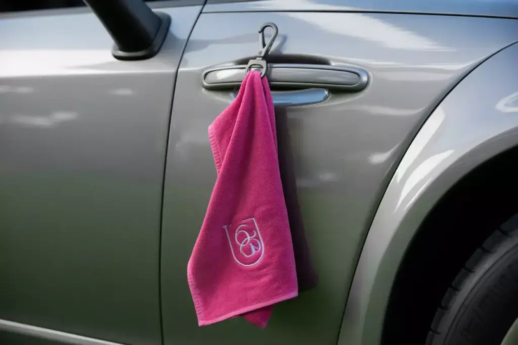 Vibrant pink quick dry embroidered golf towel magnetic clip