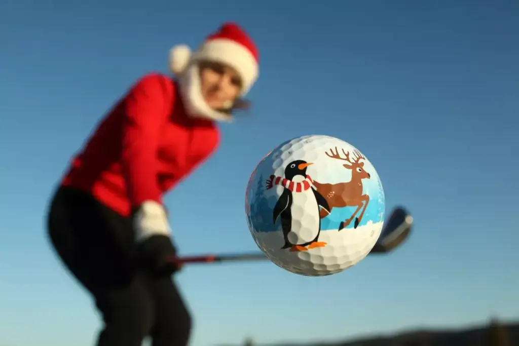 Reindeer wildlife golf ball mid flight winter sky