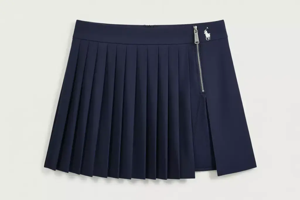 The classic navy pleated golf skirt with knife pleats and side zipper