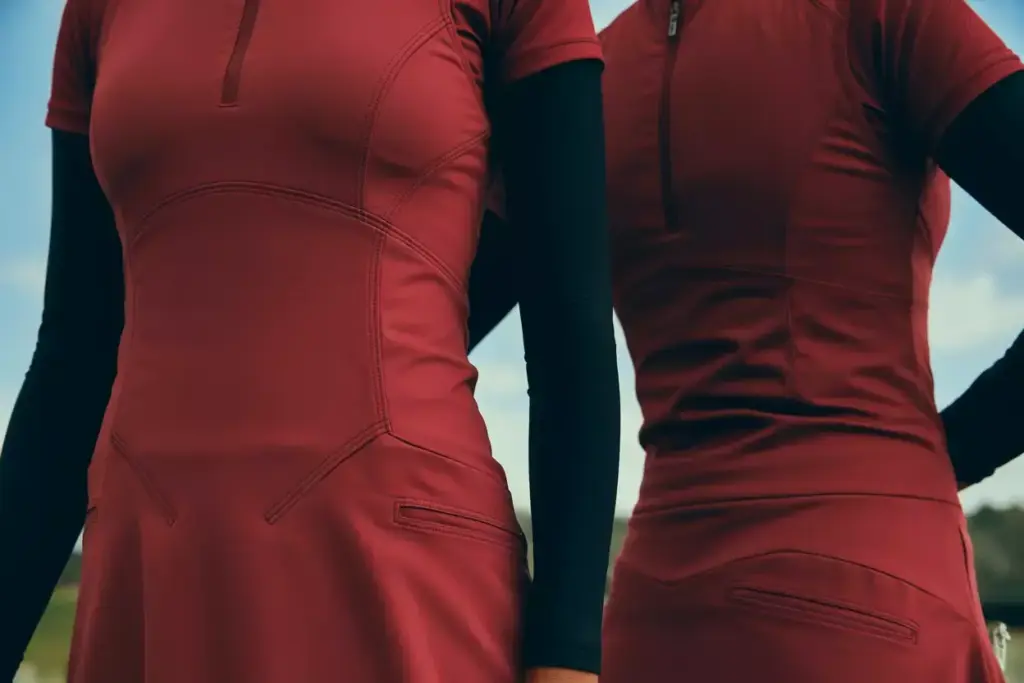 Compression fit red golf dress technical fabric ergonomic seams