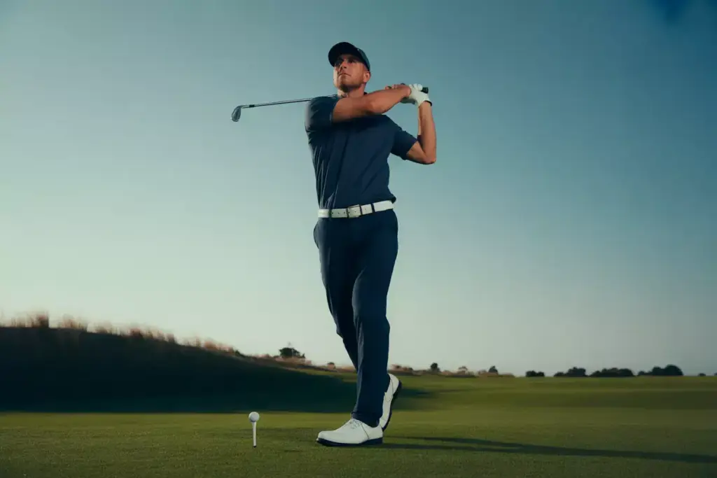 The Follow Through Balance Drill Golfer Holding A Stable Finish Position On The Fairway