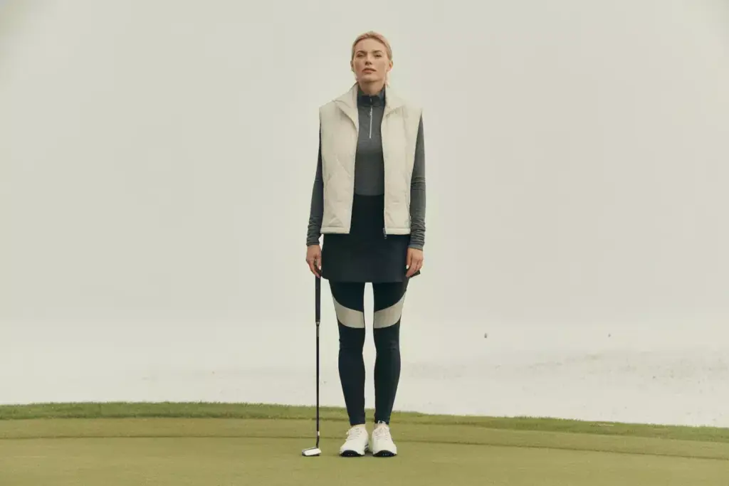 Modern minimalist golfer monochrome outfit putting green