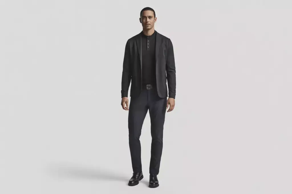 The Modern Minimalist In Black Henley Structured Blazer And Technical Pants