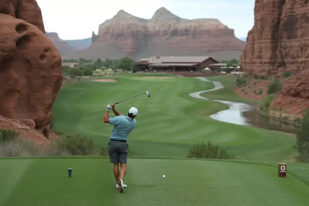 Canyon Mesa Fairway Winding Through Wash With Red Rock Walls