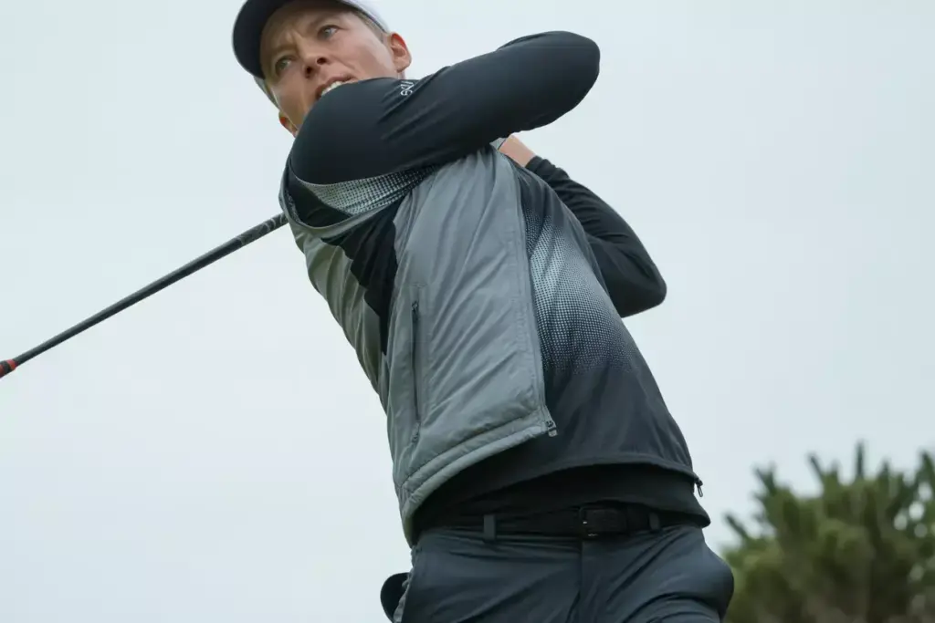 Athletic performance system compression layer stretch windbreaker golf swing