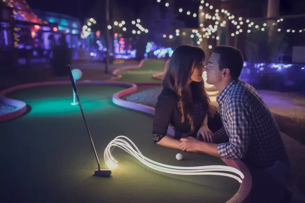 Couple Romantic Portrait Nighttime Led Glowing Mini Golf Course Bokeh Lights
