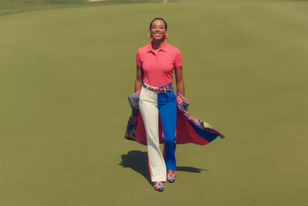 Bright fuchsia polo confident statement look on green