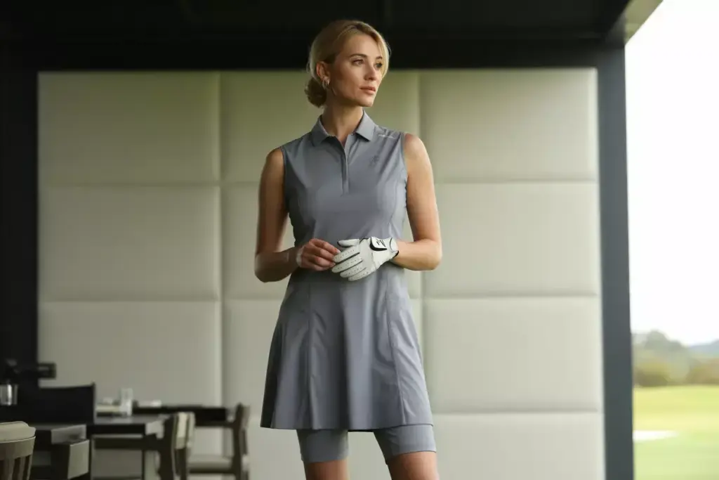 A Sophisticated Golf Dress With Built In Compression Shorts In An Upscale Indoor Facility
