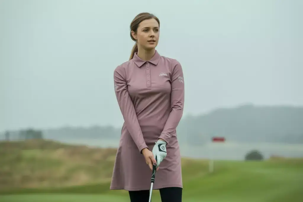 Mauve long sleeve golf dress on cool weather course