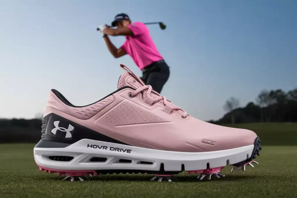 Under armour hovr drive pink fog golfer driving stance tee