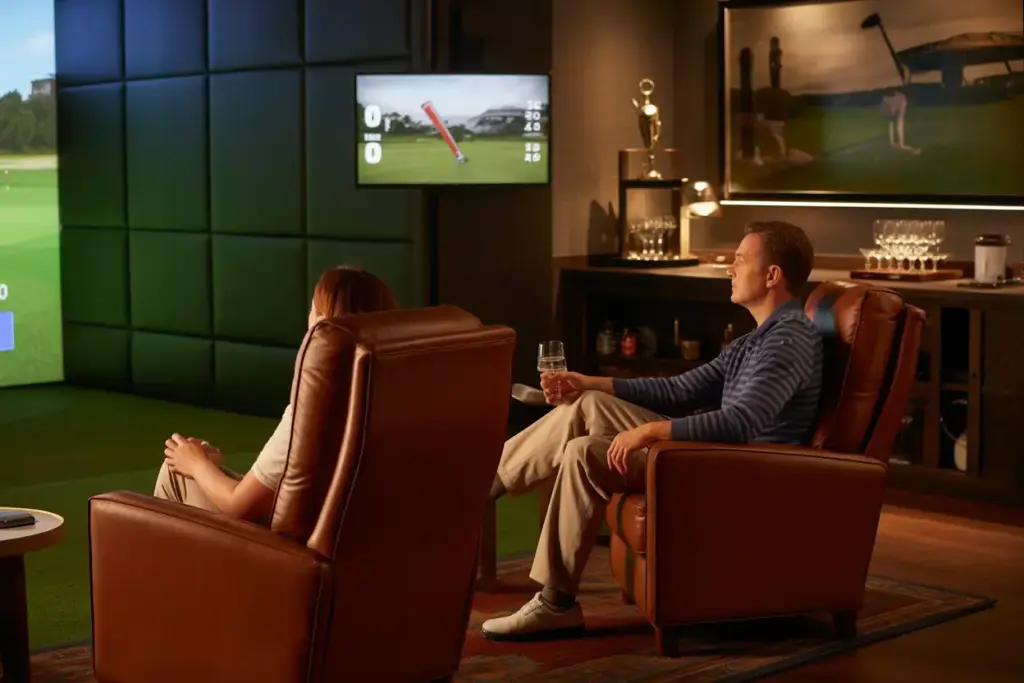 Luxury Leather Recliners And Secondary Display In Golf Simulator Lounge Area