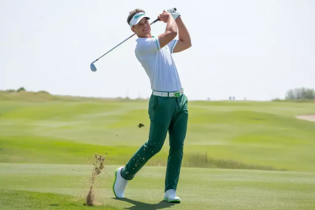 The White And Green Harmony Crisp White Top Dark Green Pants On Course