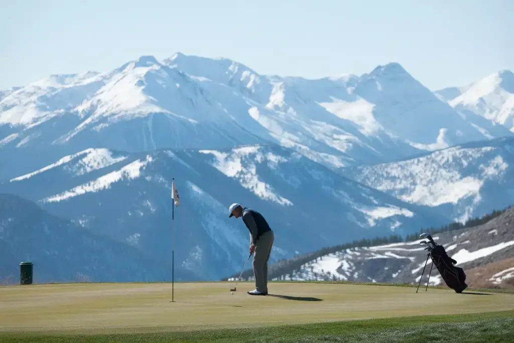 Montage Deer Valley Alpine Golf Green Snow Capped Mountain Backdrop