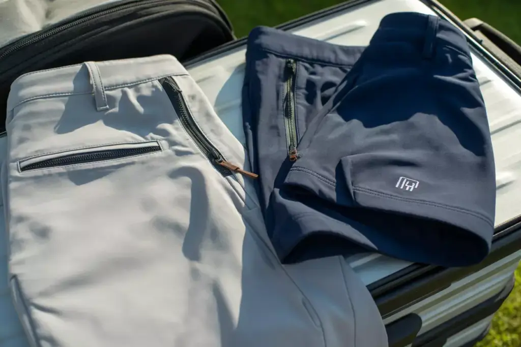 Convertible Golf Pants Showing Zip Off Leg On Travel Bag