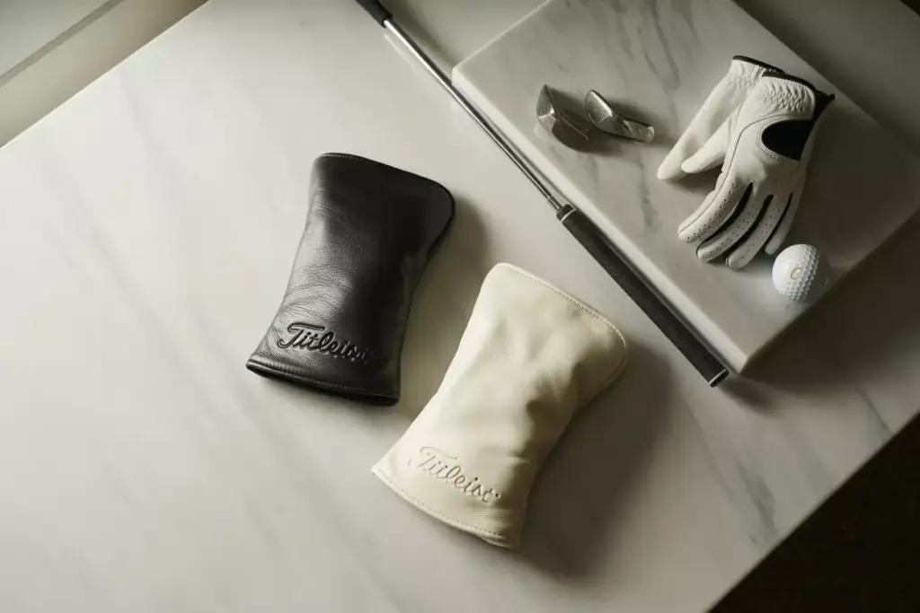 All Black And White Titleist Leather Headcovers On Marble