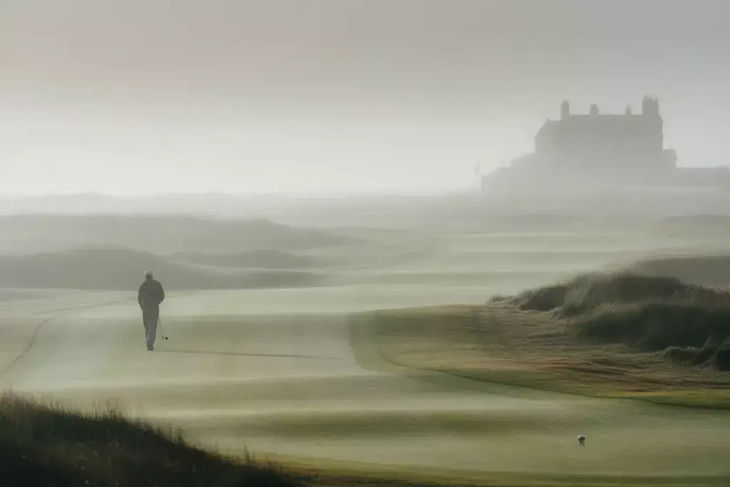St Andrews Old Course In Morning Fog With Solitary Golfer