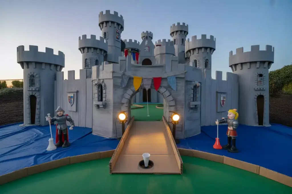 Multi Level Cardboard Castle Mini Golf Hole With Drawbridge Moat And Knight Figurines