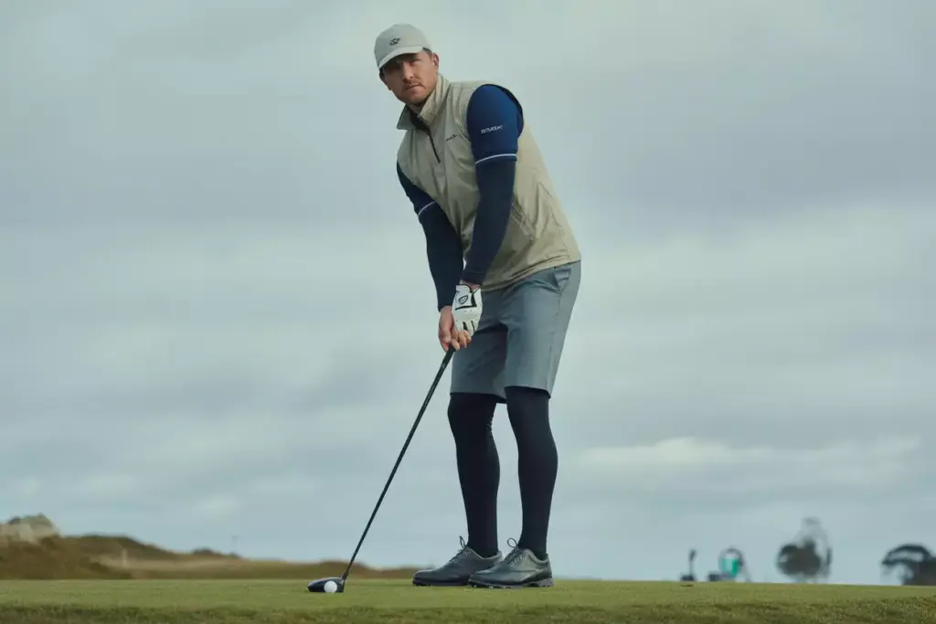 The Weather Ready Layered Look With Vest Base Layer And Waterproof Shoes Under Overcast Sky