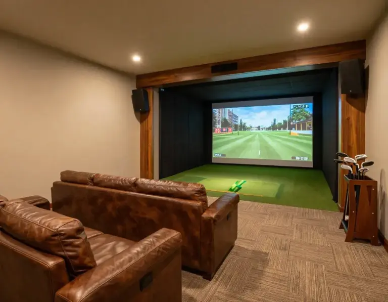Featured Finished Simulator Room With Surround Sound Seating And Club Storage